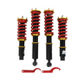 Adjustable coilover shock kit with red springs, black dampers, and red mounting brackets