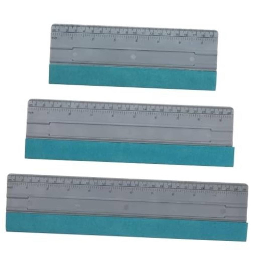 Large vinyl squeegee tool with gray ruler edge and teal felt pad for film installation