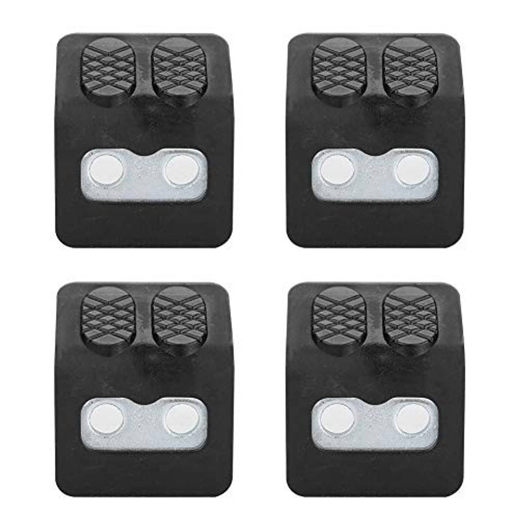 Pair of black tire changer jaw protectors with textured grips and silver double-hole inserts