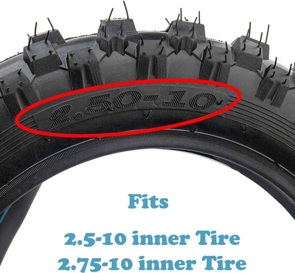 Close-up of black knobby tire tread with deep traction blocks