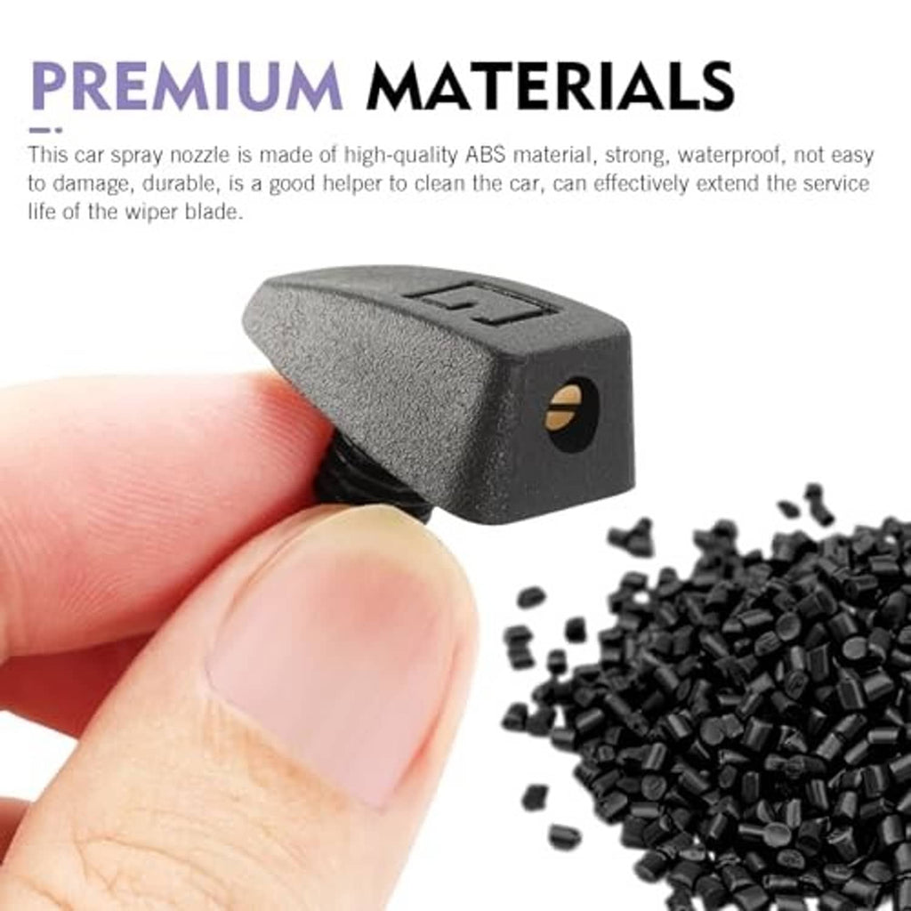 Black textured windshield washer nozzle with gold insert held between fingers