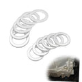 Six silver crush washers with circular sealing rings, shown as a paired set