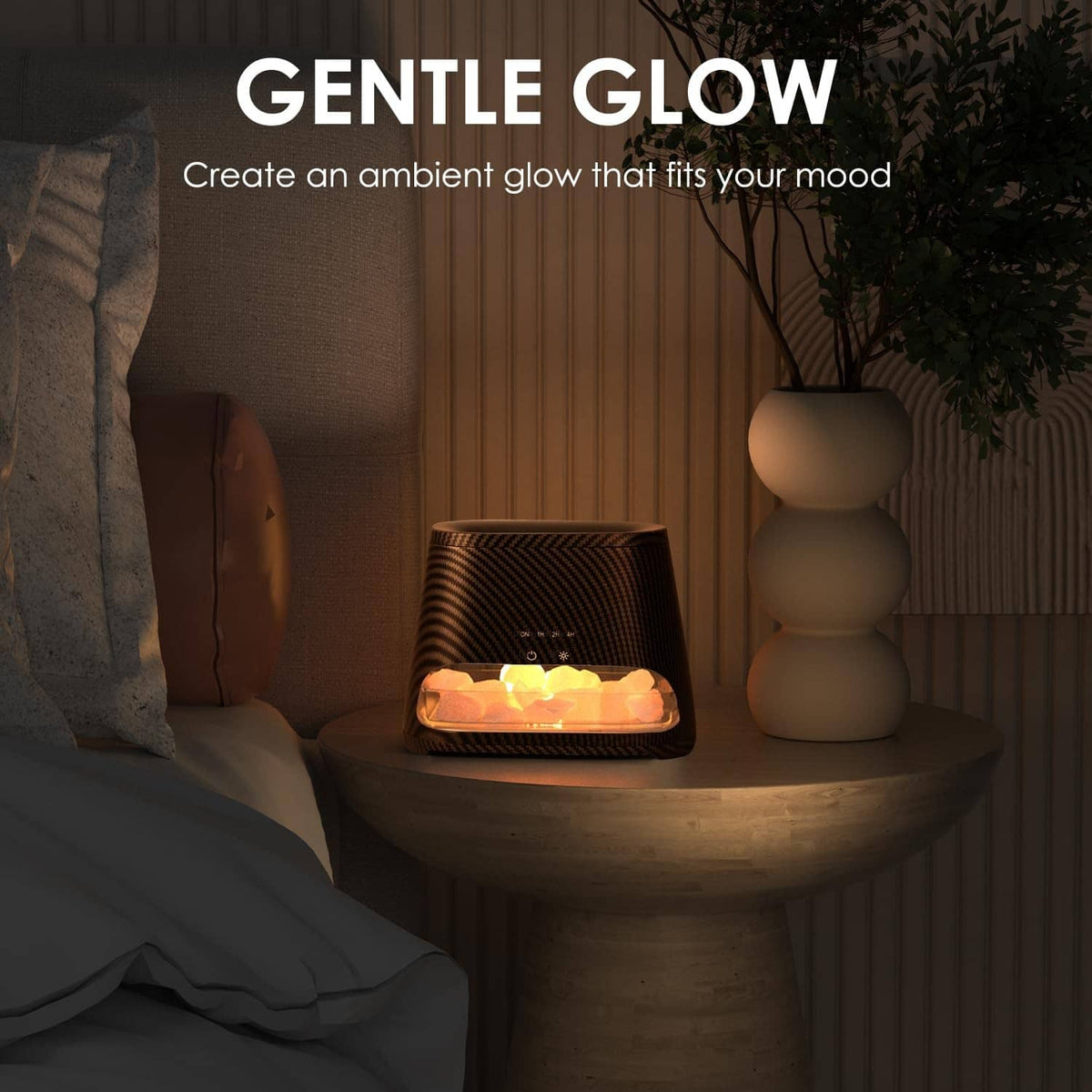 Carbon black salt diffuser with warm ambient glow on bedside table