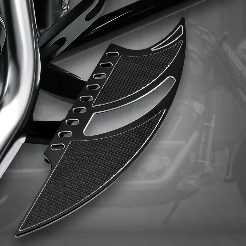 Front motorcycle floorboard footpads, black textured grip with silver curved accents