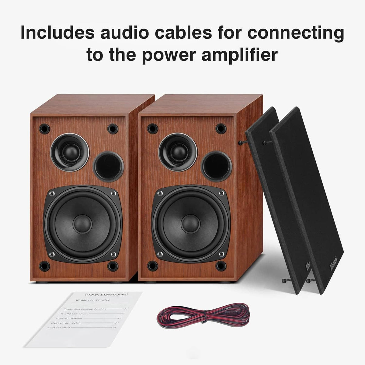 Passive bookshelf speakers with wood cabinets and included audio cables for amplifier connection