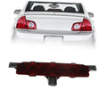 Center high mount brake light with red lens and black mounting base.