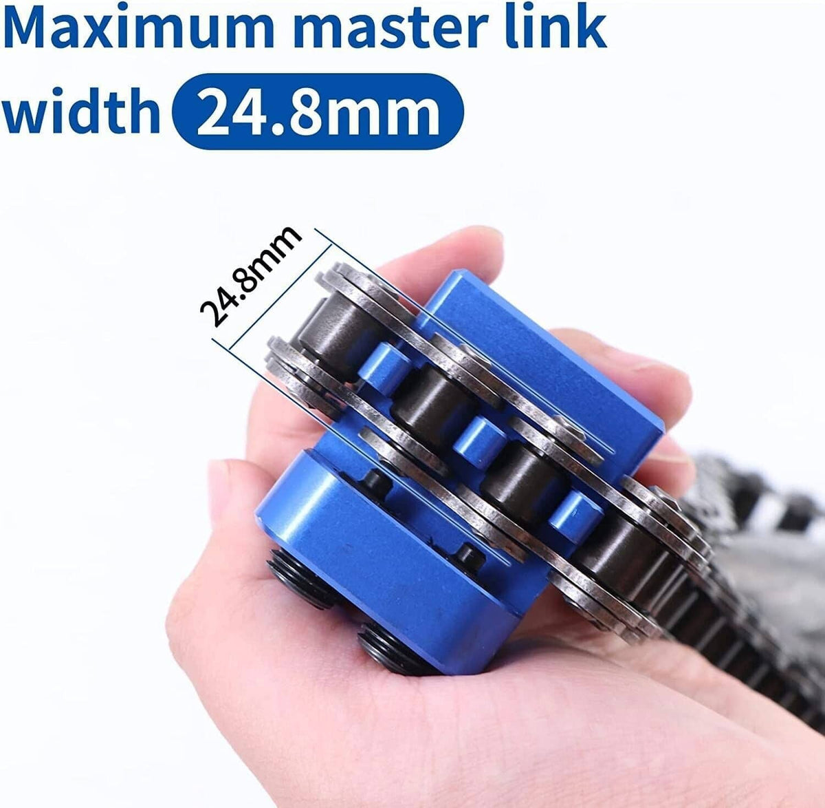 Blue master link chain press tool held in hand with stacked metal pressing rings