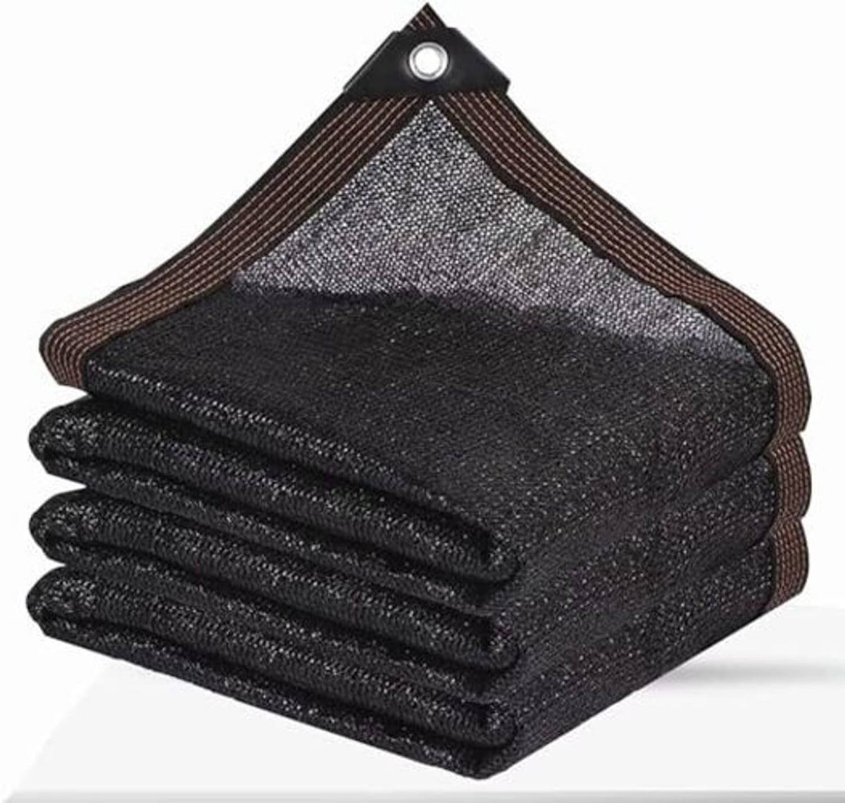 Rolled black shade cloth with brown edge binding and metal grommet at the top