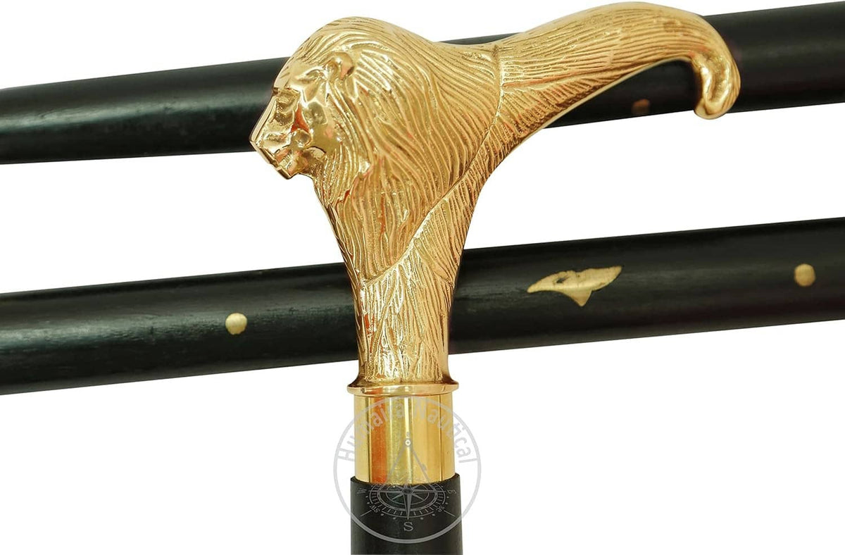 Brass lion-head handle on black wooden walking stick with gold collar and speckled shaft