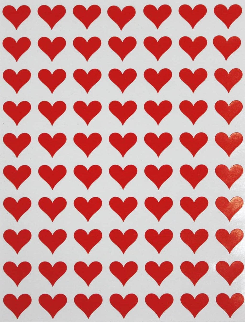 Repeating red heart stickers pattern on a white sticker sheet backing