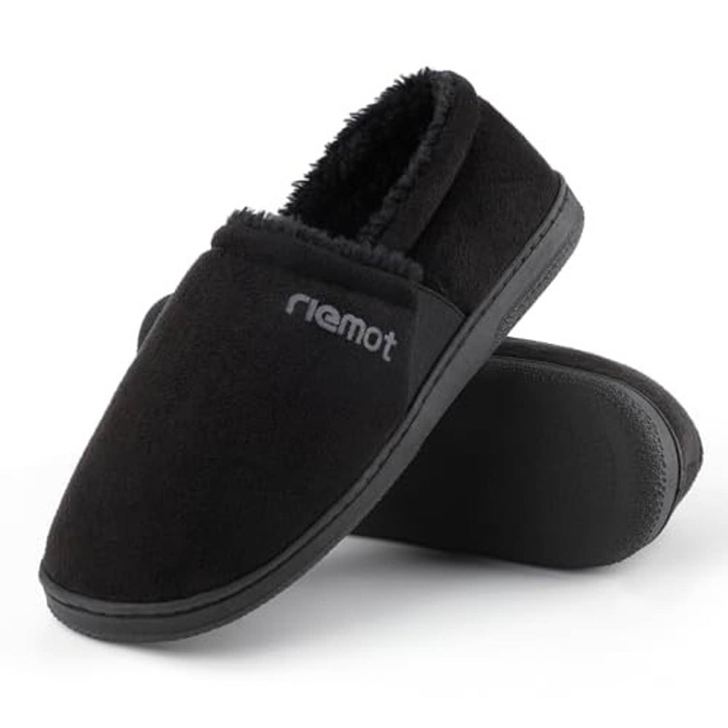 Black moccasin slippers with faux-fur lining and rounded molded sole, side view.
