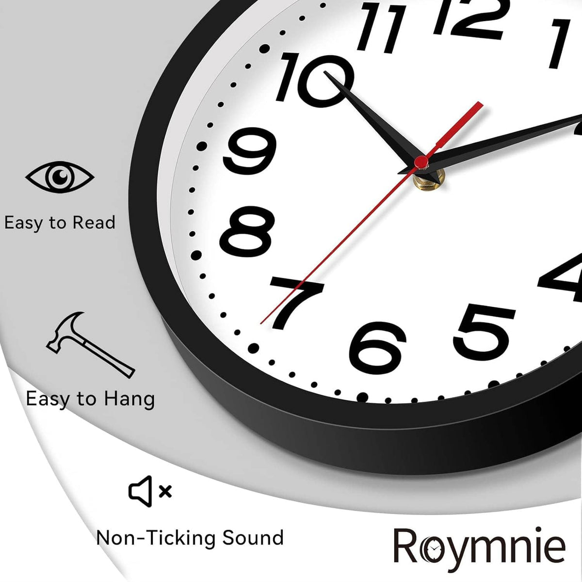Black-framed wall clock close-up with white dial, dotted markers, and red second hand