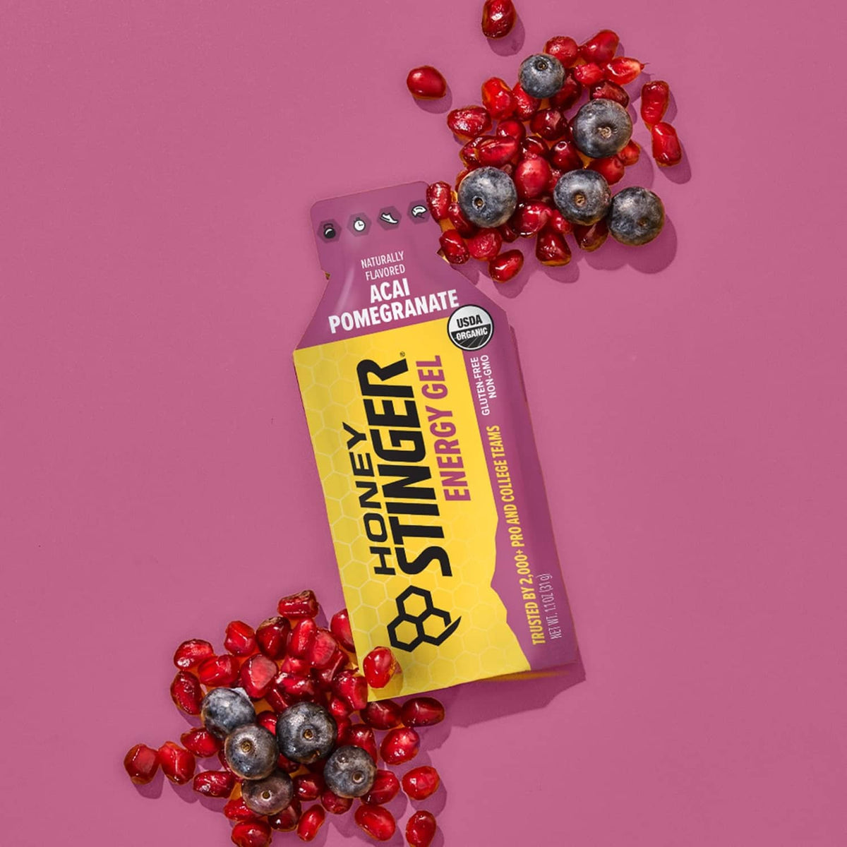 Acai pomegranate energy gel pouch with berry graphics and fruit toppings