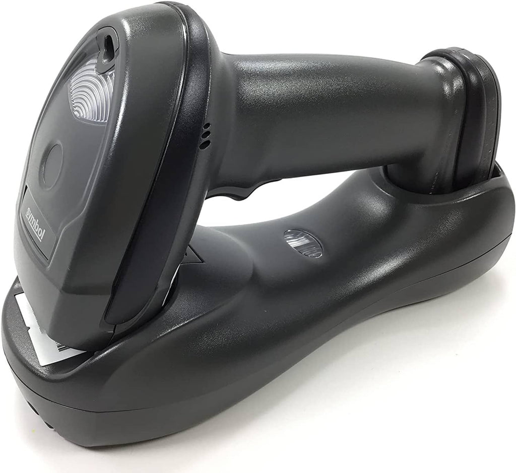 Handheld wireless barcode scanner with cradle base, angled view