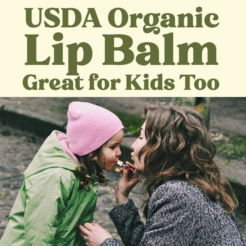 Child and parent applying an organic lip balm from a small tube