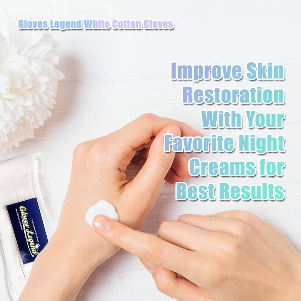 White cotton moisturizing gloves with skin cream applied on fingertips