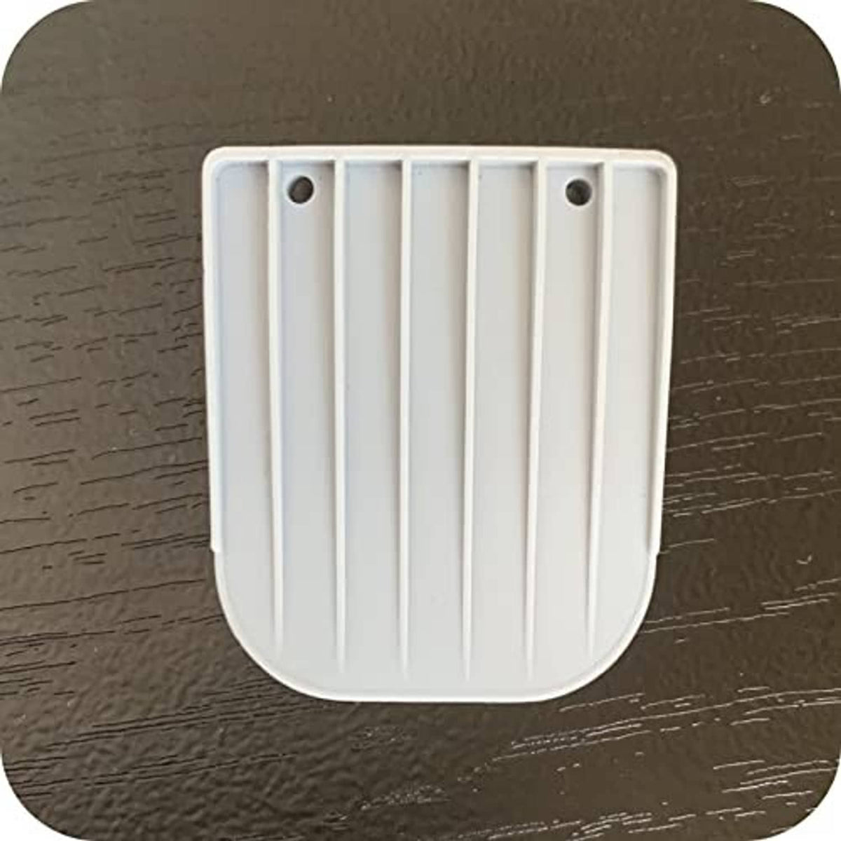 White slotted exhalation valve replacement insert with two mounting holes