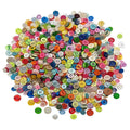 Assorted round resin craft buttons in many colors, piled together for sewing.