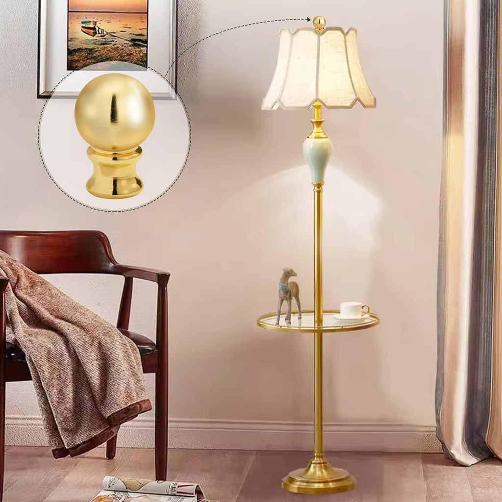 Gold ball lamp finial cap knob on a lamp base with matching threaded top