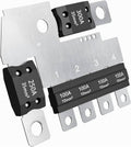 Main fuse block plate with black fuse modules and silver metal mounting tabs, 1–4 labels