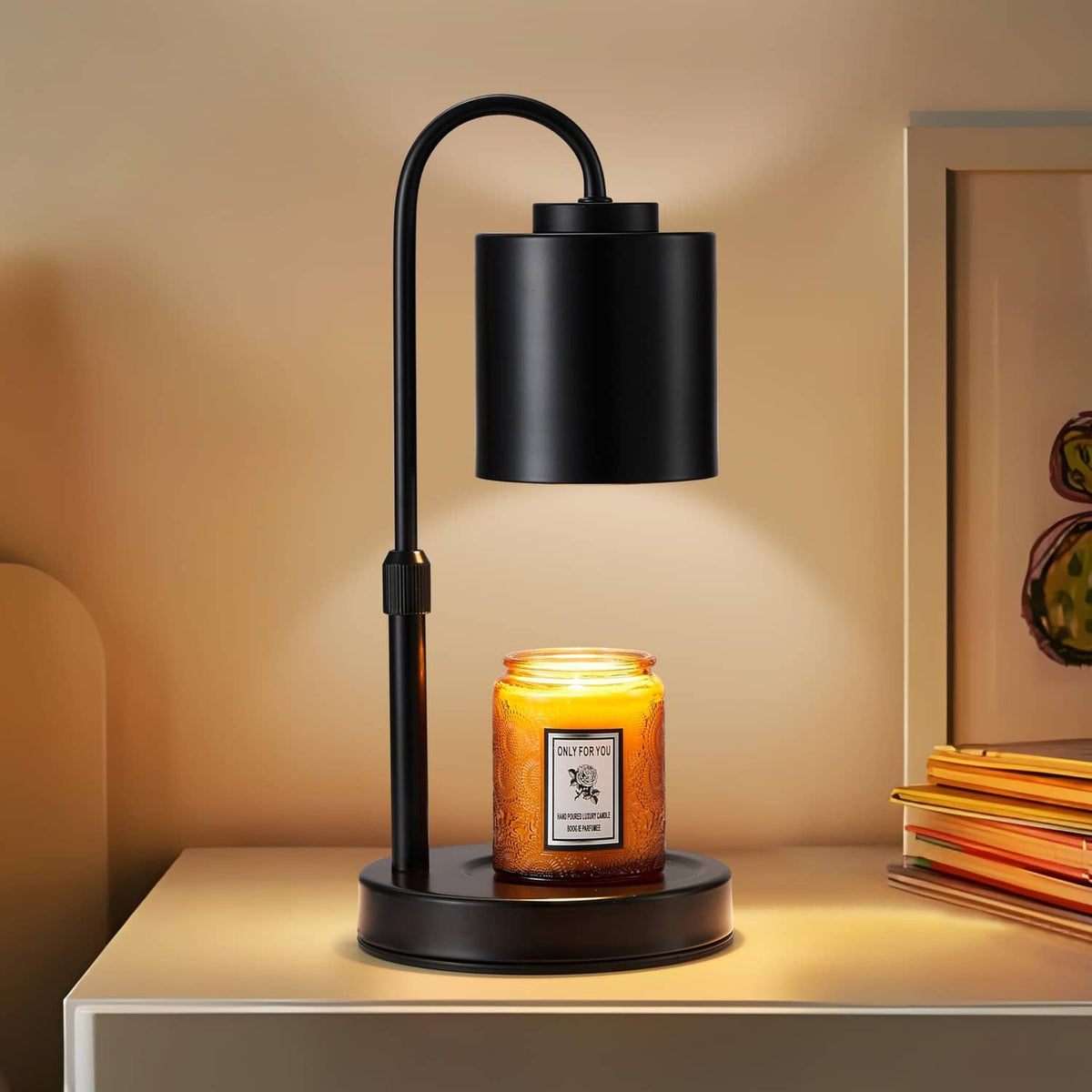 Black candle warmer lamp with adjustable gooseneck and metal shade, warming a jar candle