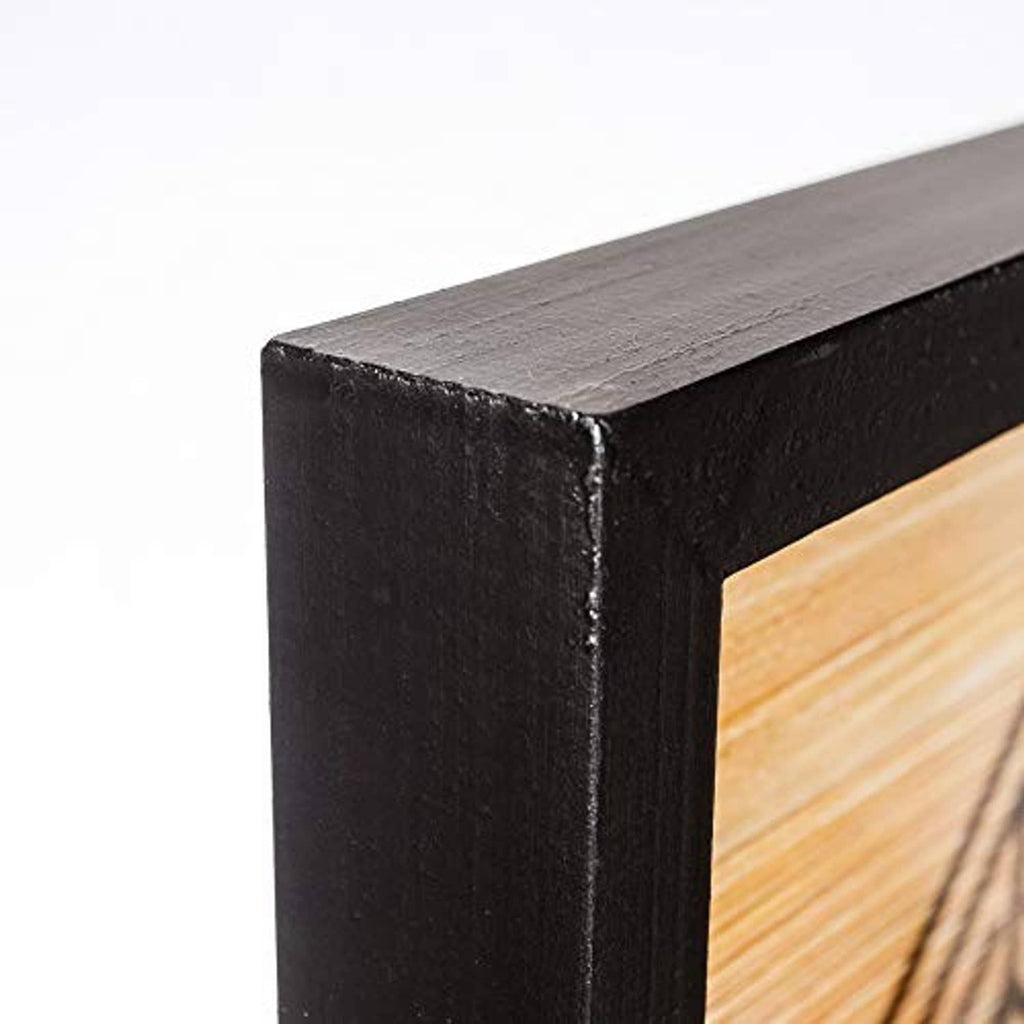 Black wooden picture frame corner with squared edge and visible wood texture