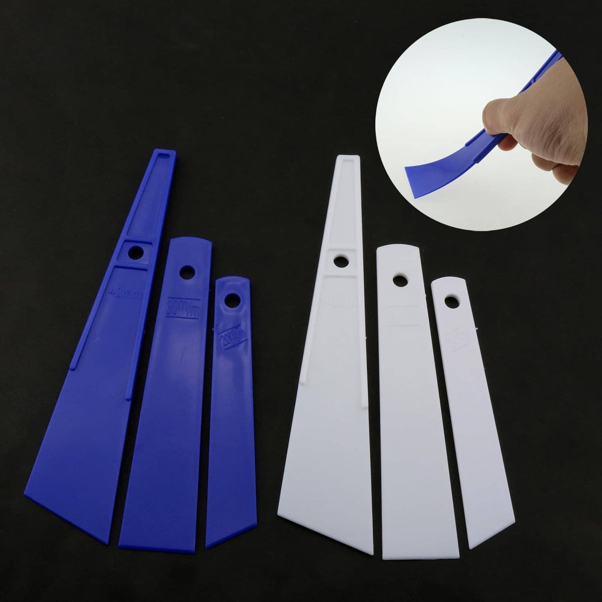 Plastic glue spreader smear sticks set in blue and white, hand applies adhesive