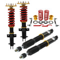 Coilover strut set with black shocks, red springs, and gold top mounts