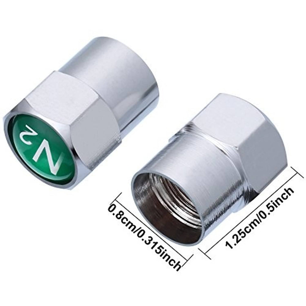 Silver metal tire valve stem cap close-up with green N2 insert and threads
