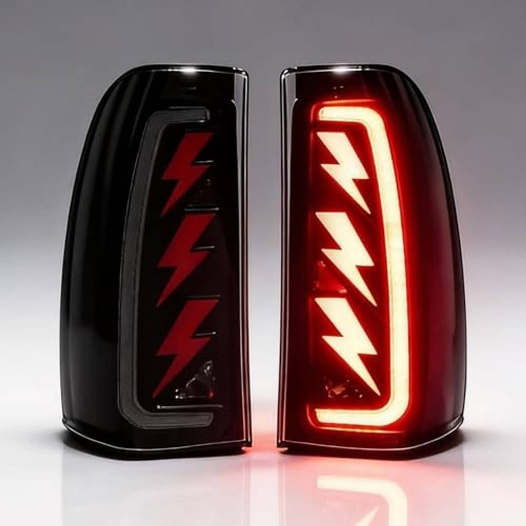 Set of two black LED tail lights with red sequential lightning-style light bar lit