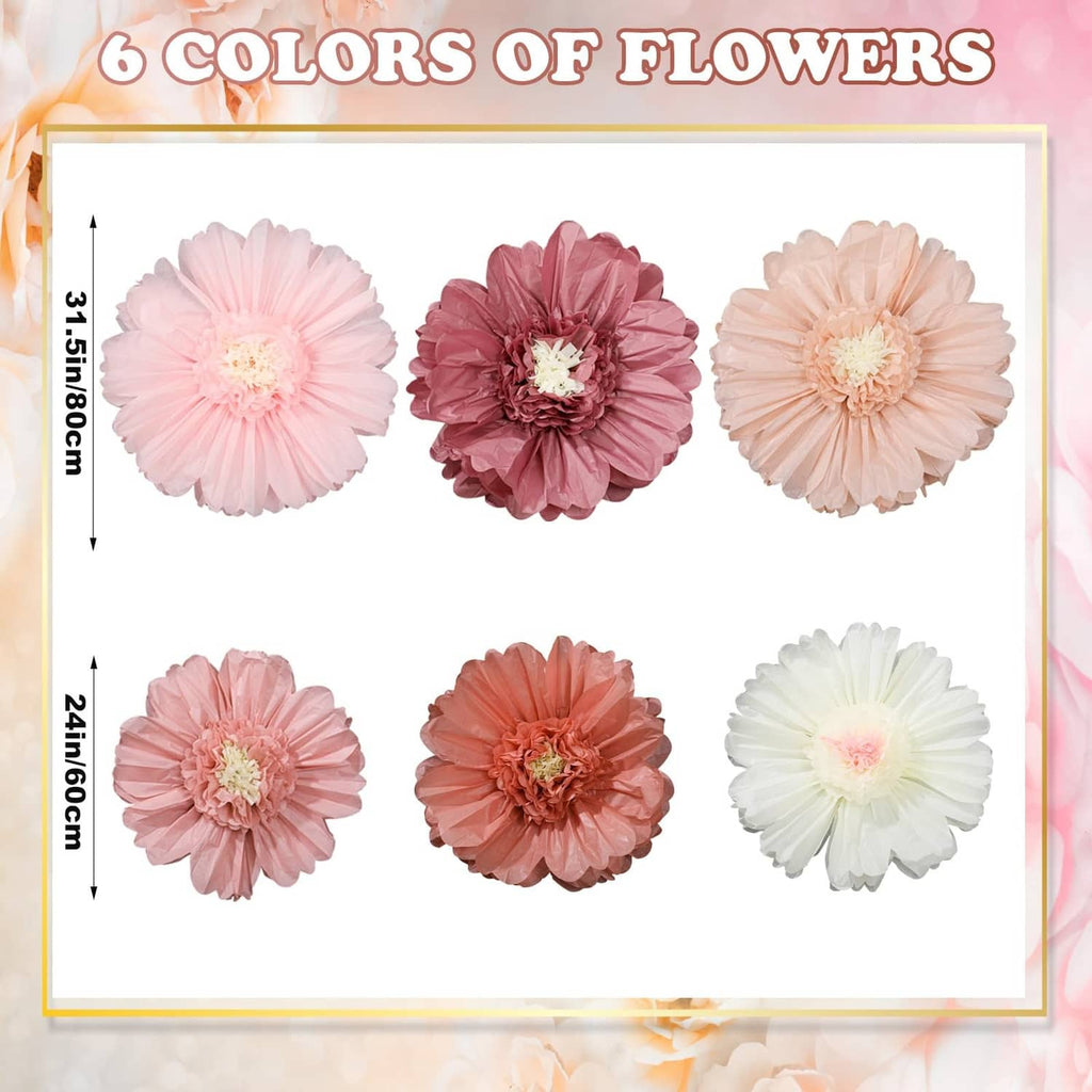 Six assorted tissue paper flowers, round rosette blooms in pink and white shades