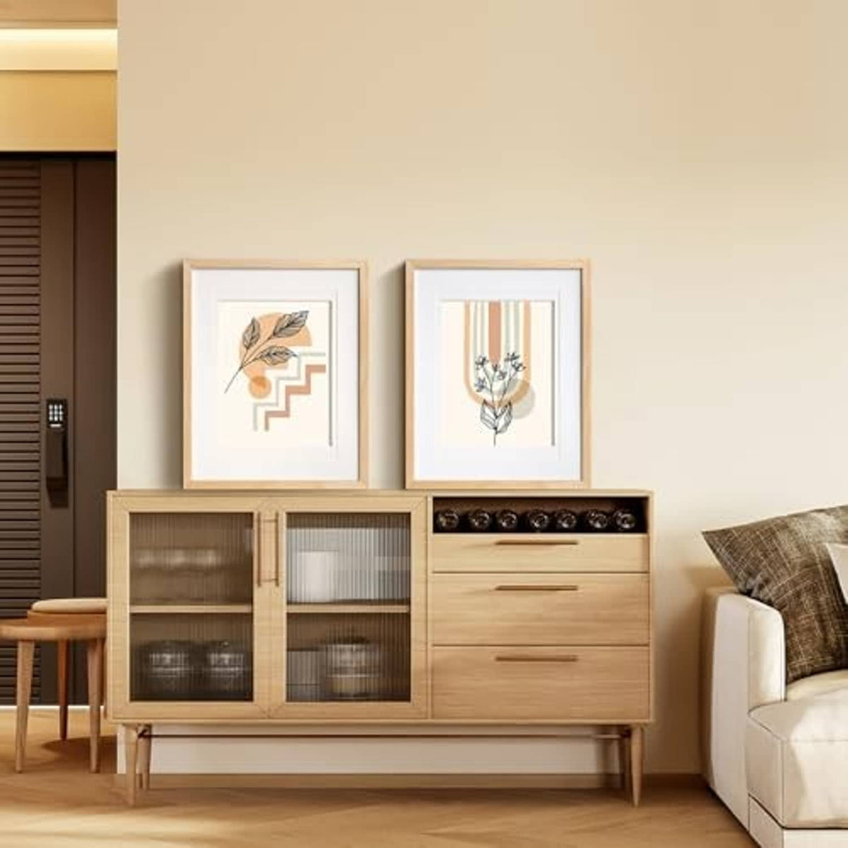 Two natural wood picture frames with white mats on a wall above a console cabinet
