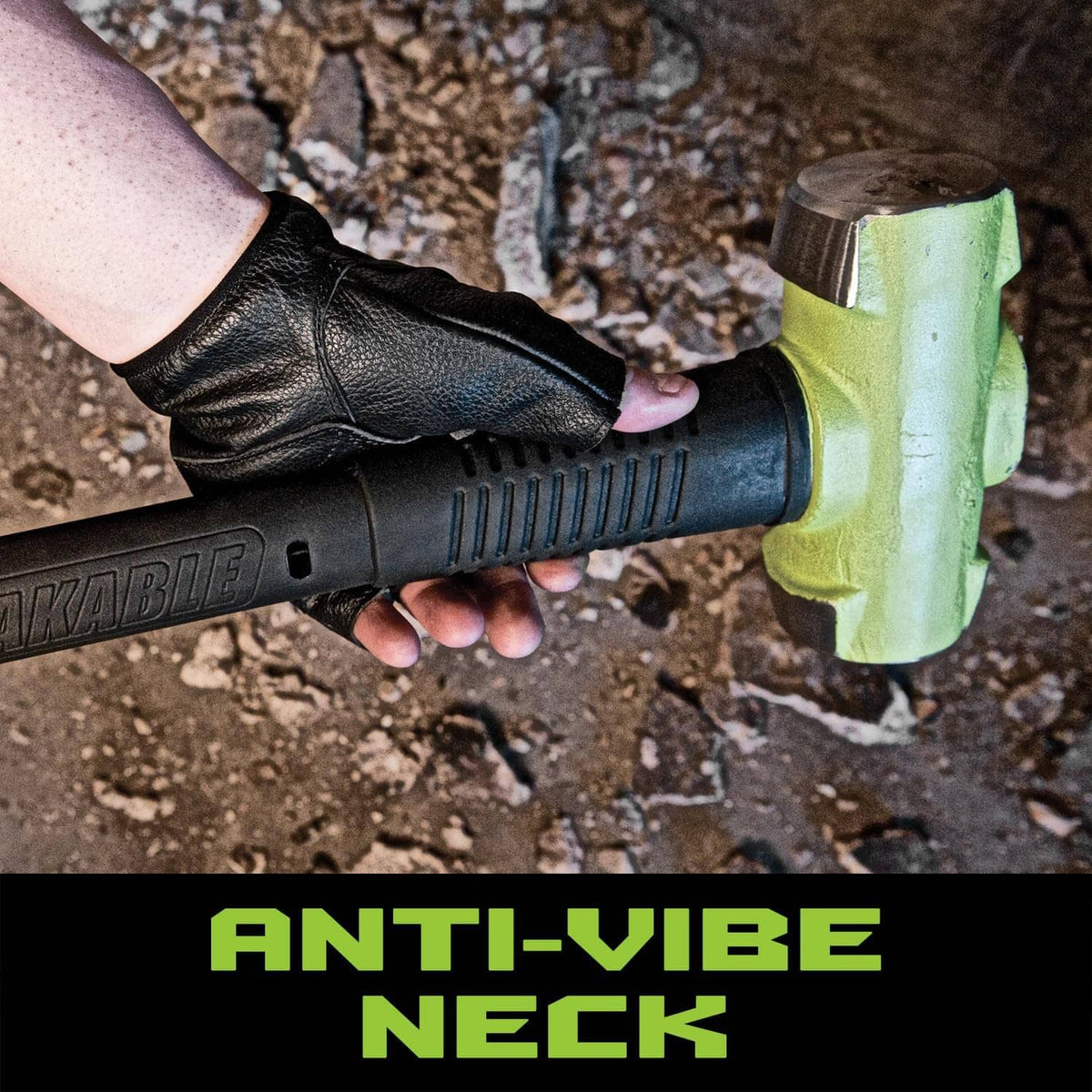 Gloved hand holding neon green sledge hammer with ribbed rubber grip handle
