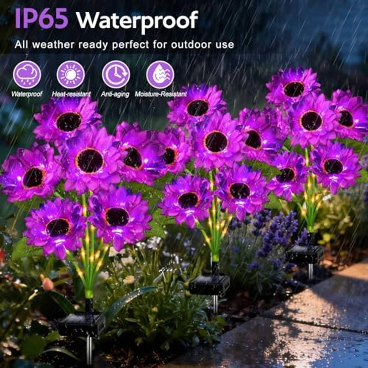 Purple solar sunflower lights with bright glow, black stakes among garden flowers