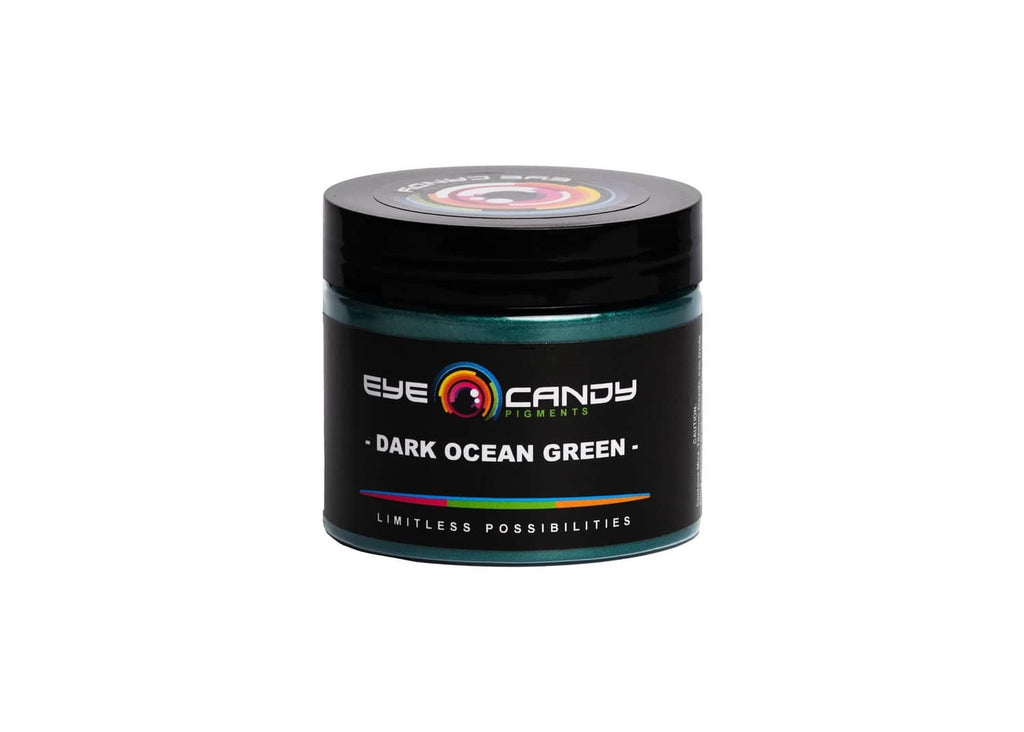 Dark green mica powder jar with black lid and teal shimmer label