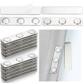 Set of silver curtain weights with round magnet discs, stacked and shown in pieces