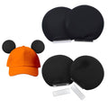 Four-piece set of black magnetic mouse-ear hat toppers with magnet strips and one cap.