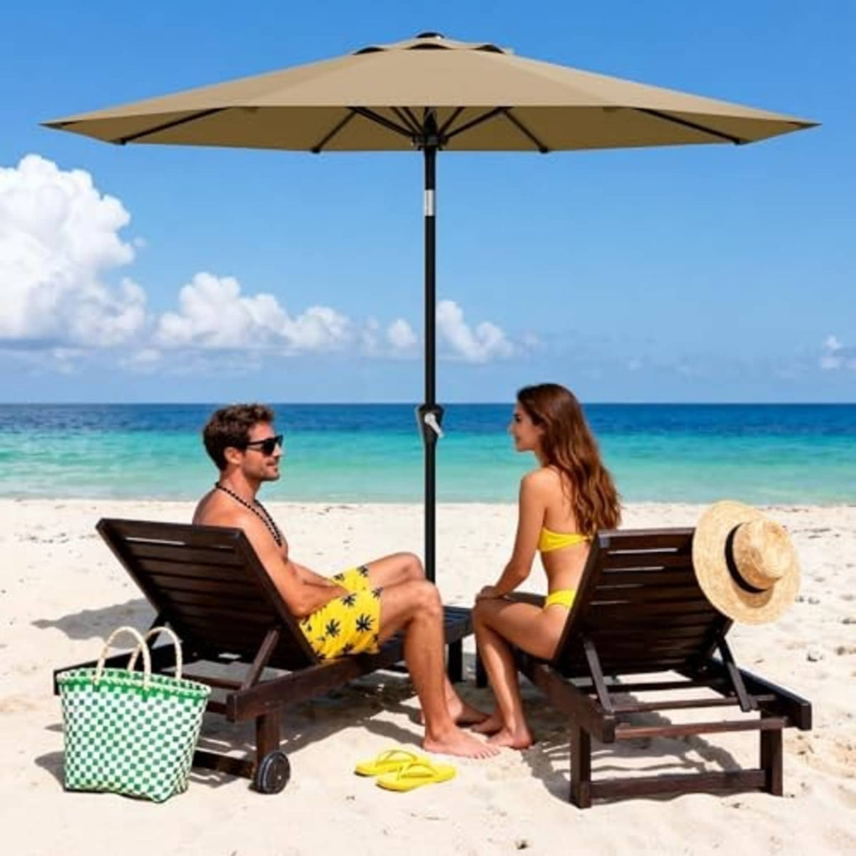 Tan patio umbrella on black pole, open octagonal canopy beside beach seating