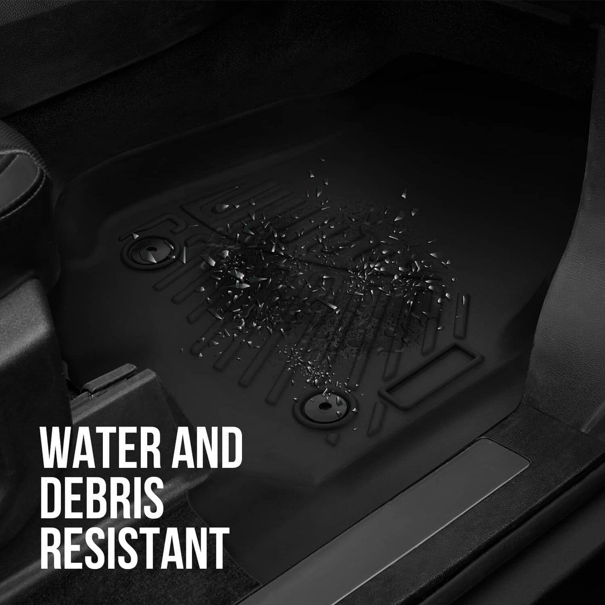 Black molded floor mat surface with debris-resistant ridges and channels