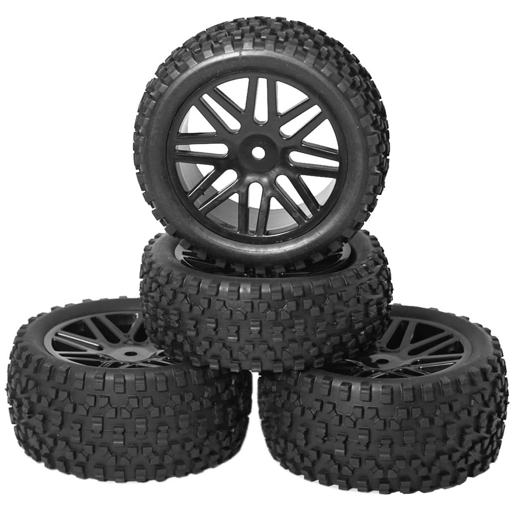 Set of 4 black RC wheels with multi-spoke rims and deep tread tires