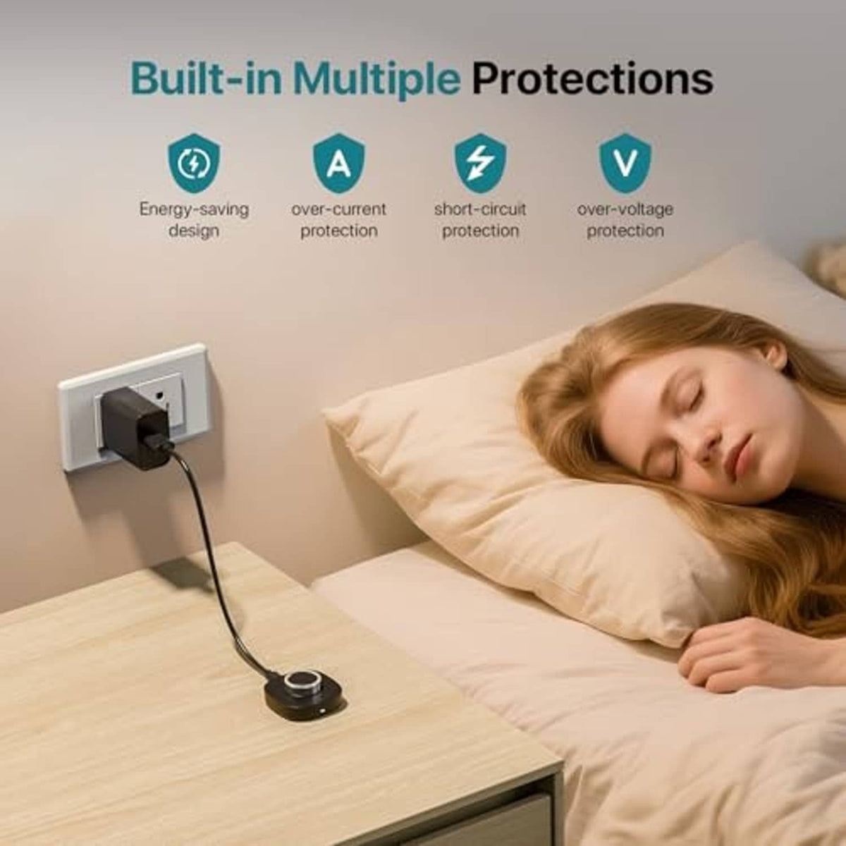 Black charging dock and cable plugged into wall outlet for bedside charging