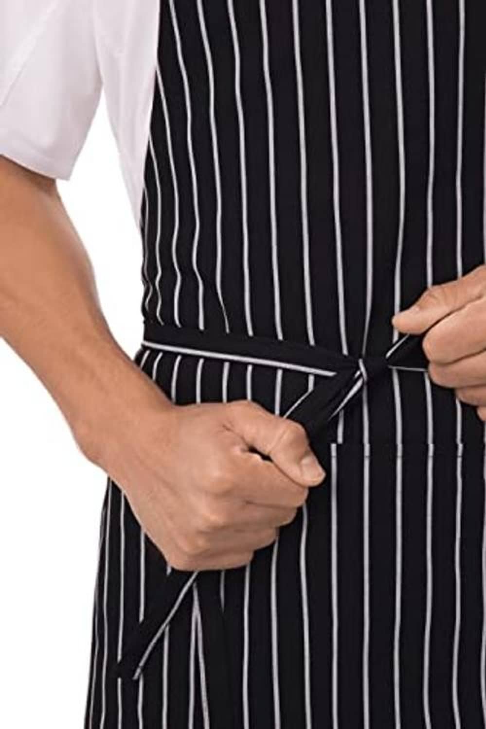 Black chef apron with white vertical stripes, tied waist strap close-up