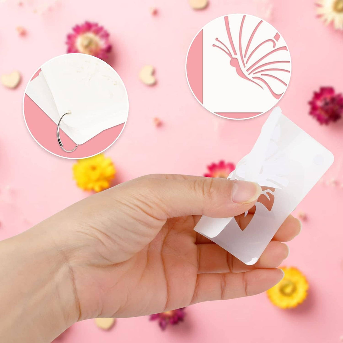 White stencil sheet with a butterfly cutout, held by a hand