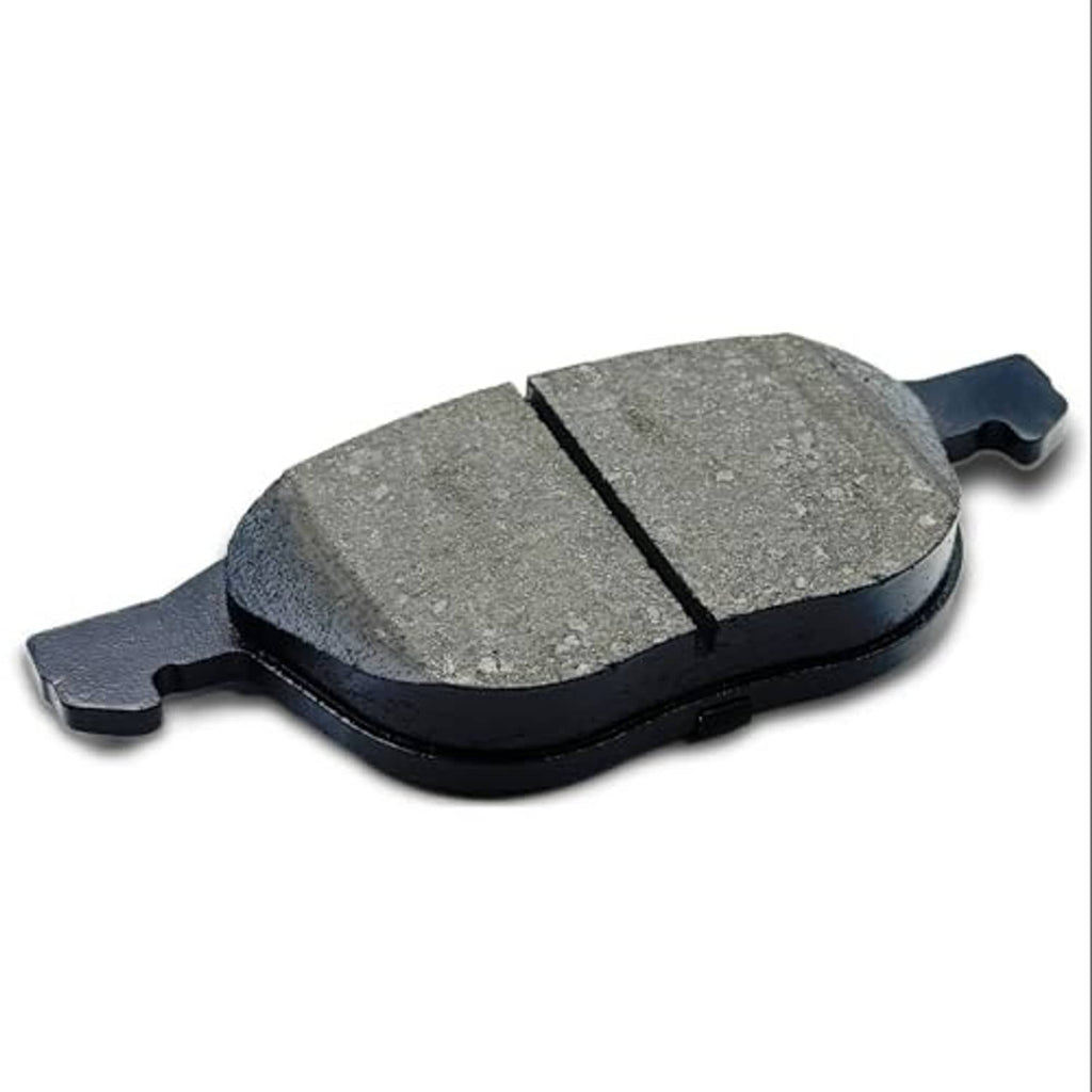 Ceramic brake pad in close-up, gray friction faces with black base and side tabs