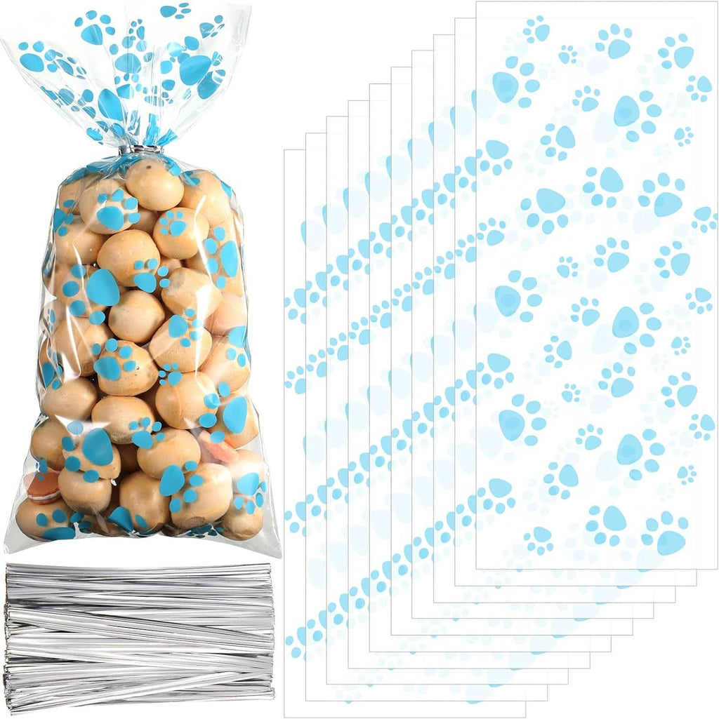 Single clear dog treat cellophane bag with blue paw prints and tied top, with silver heat-seal edge.