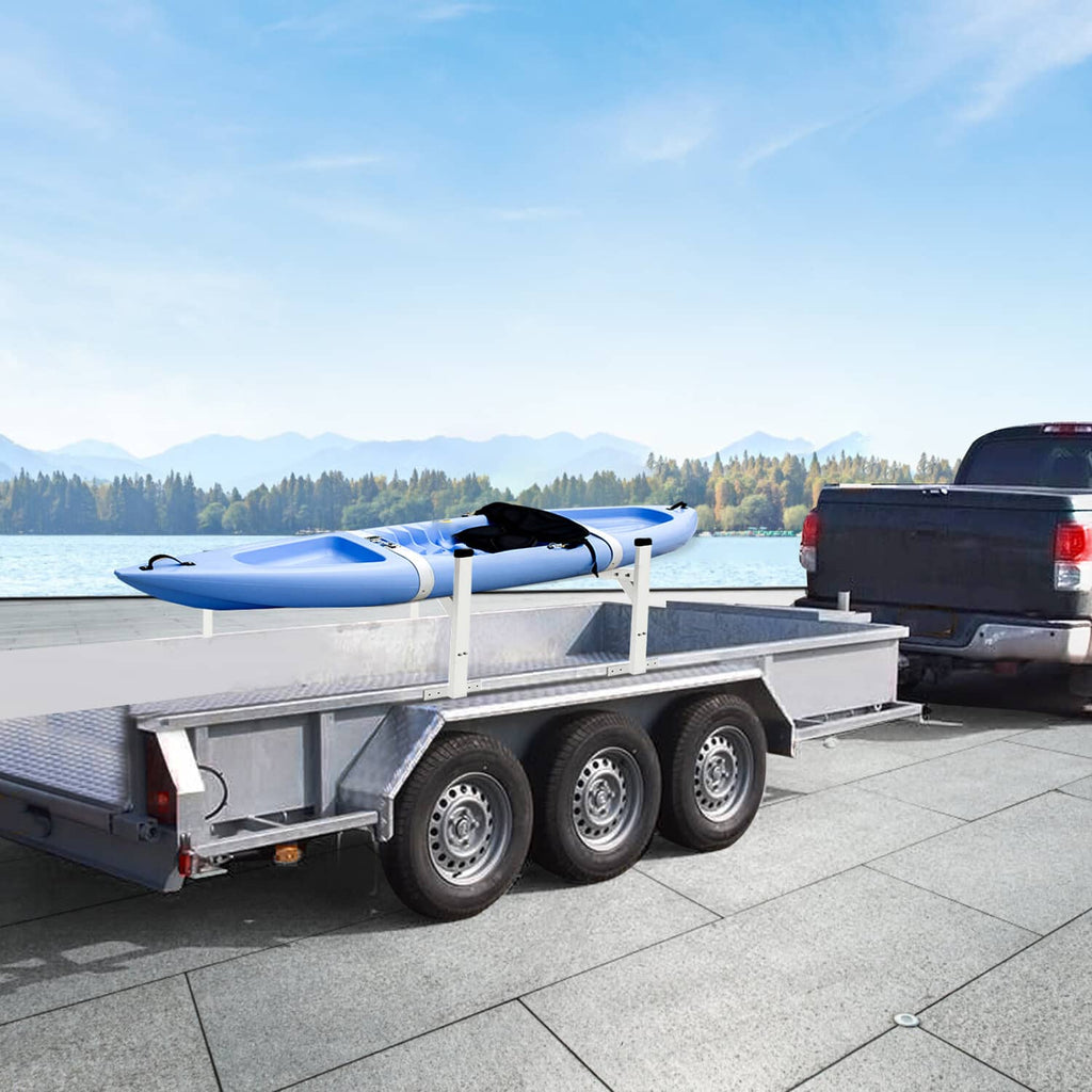 Roof mount ladder rack bracket installed on open utility trailer, white steel with black caps