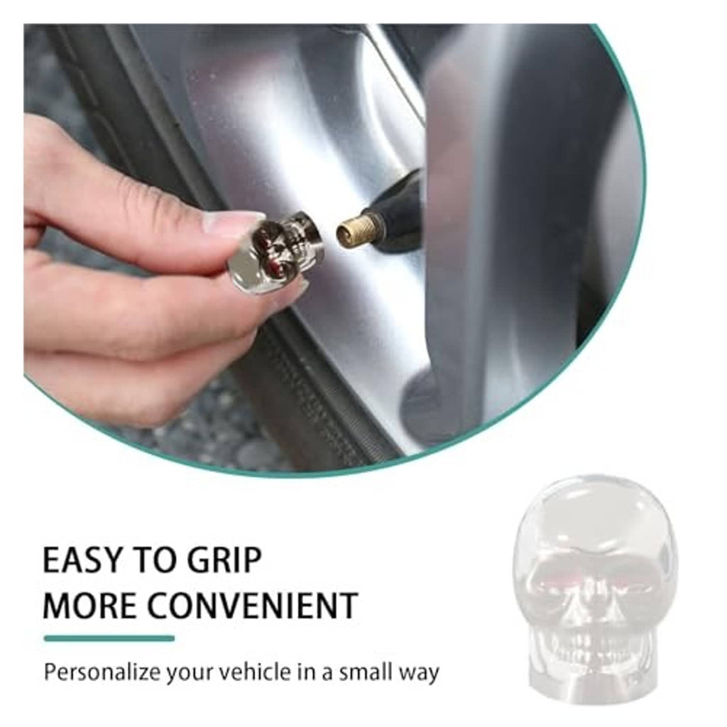 Hand installing chrome skull tire valve stem cap with red eyes onto valve