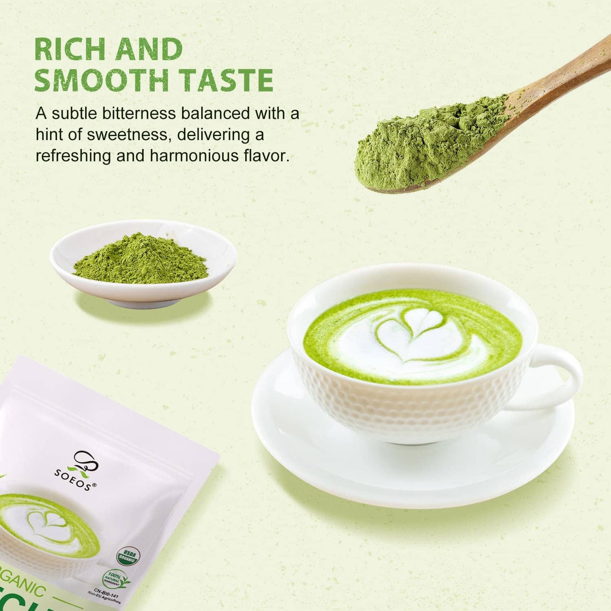 Green matcha latte in cup with small bowl of matcha powder and spoon