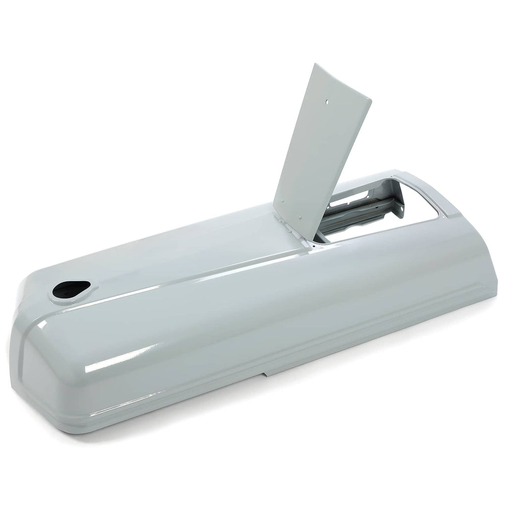 Gray tractor engine hood with raised battery door area and black round opening
