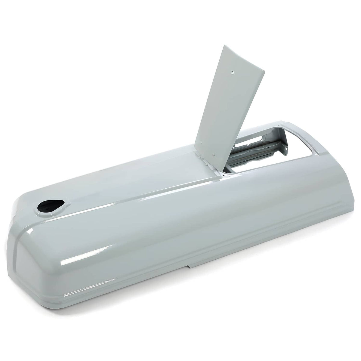 Gray tractor engine hood with raised battery door area and black round opening